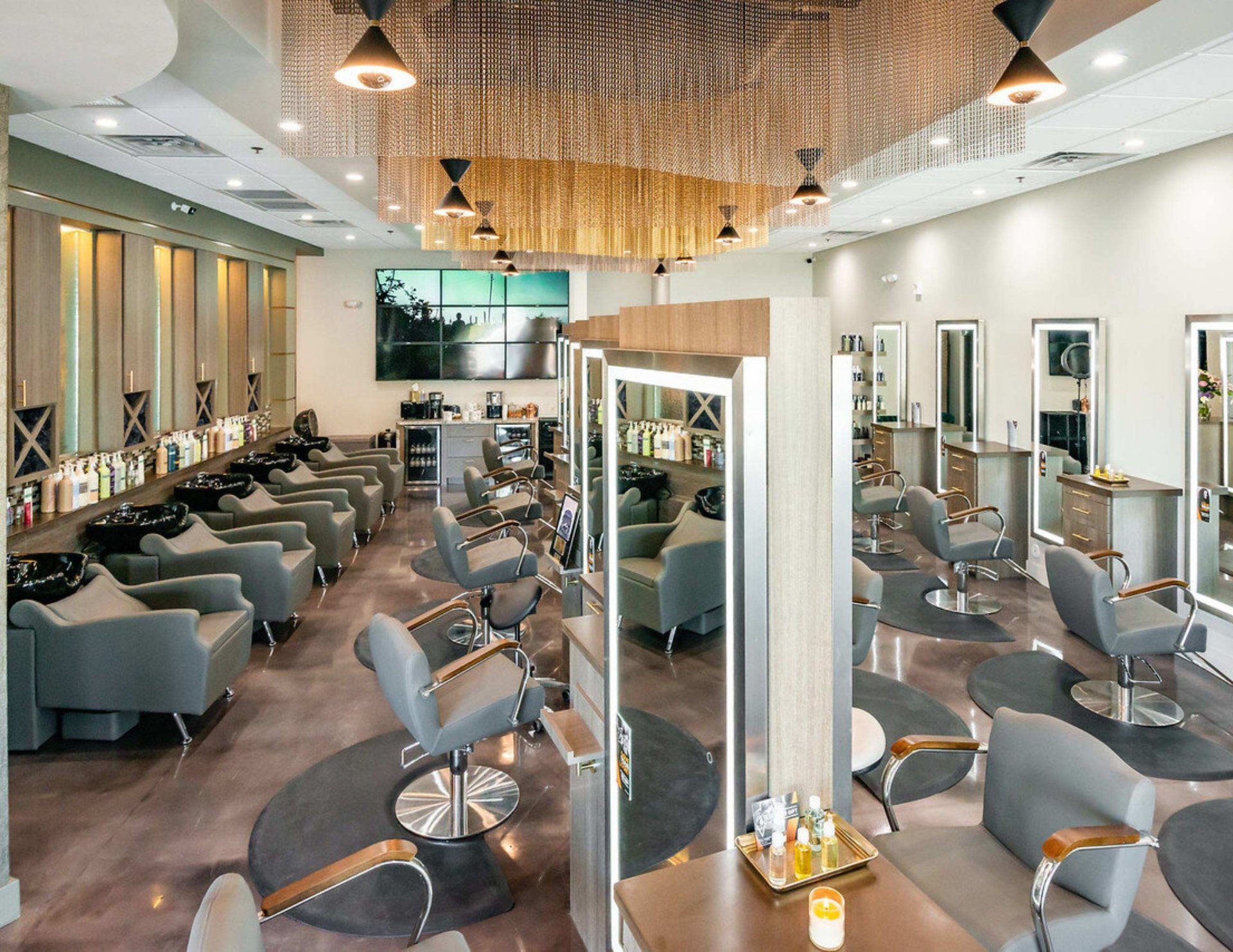 Couples massage room with draped tables and warm lighting